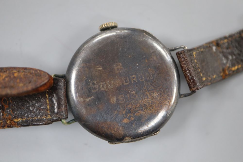 A gentlemans early 20th century silver manual wind wrist watch, the back inscribed B Squadron 1913 (a.f.).